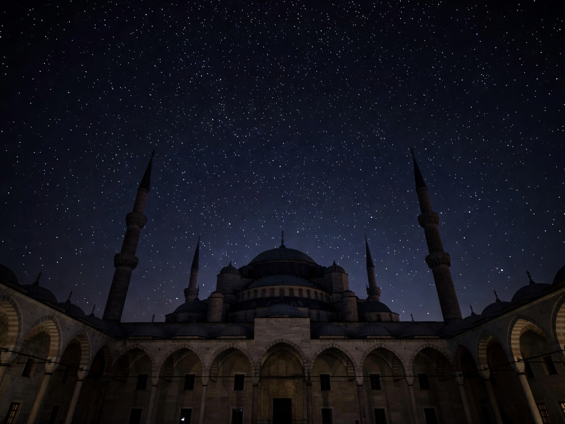 A grand dome silhouette under a night sky lit with celestial stars